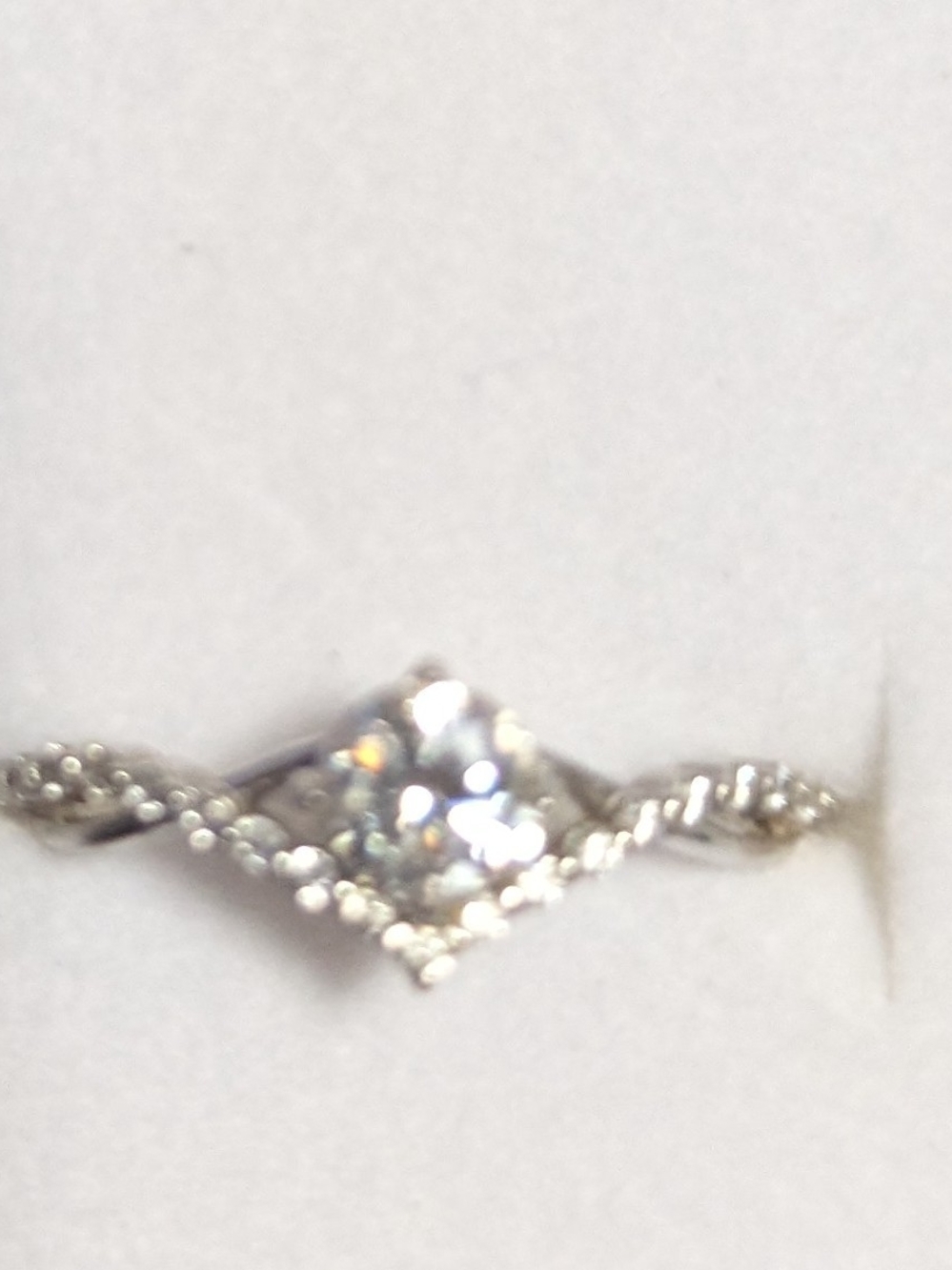 Silver-Tone Twisted Band Ring with Clear Center Stone